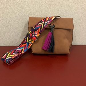 Cute, small camel color purse with colorful strap and tassels. Never used.